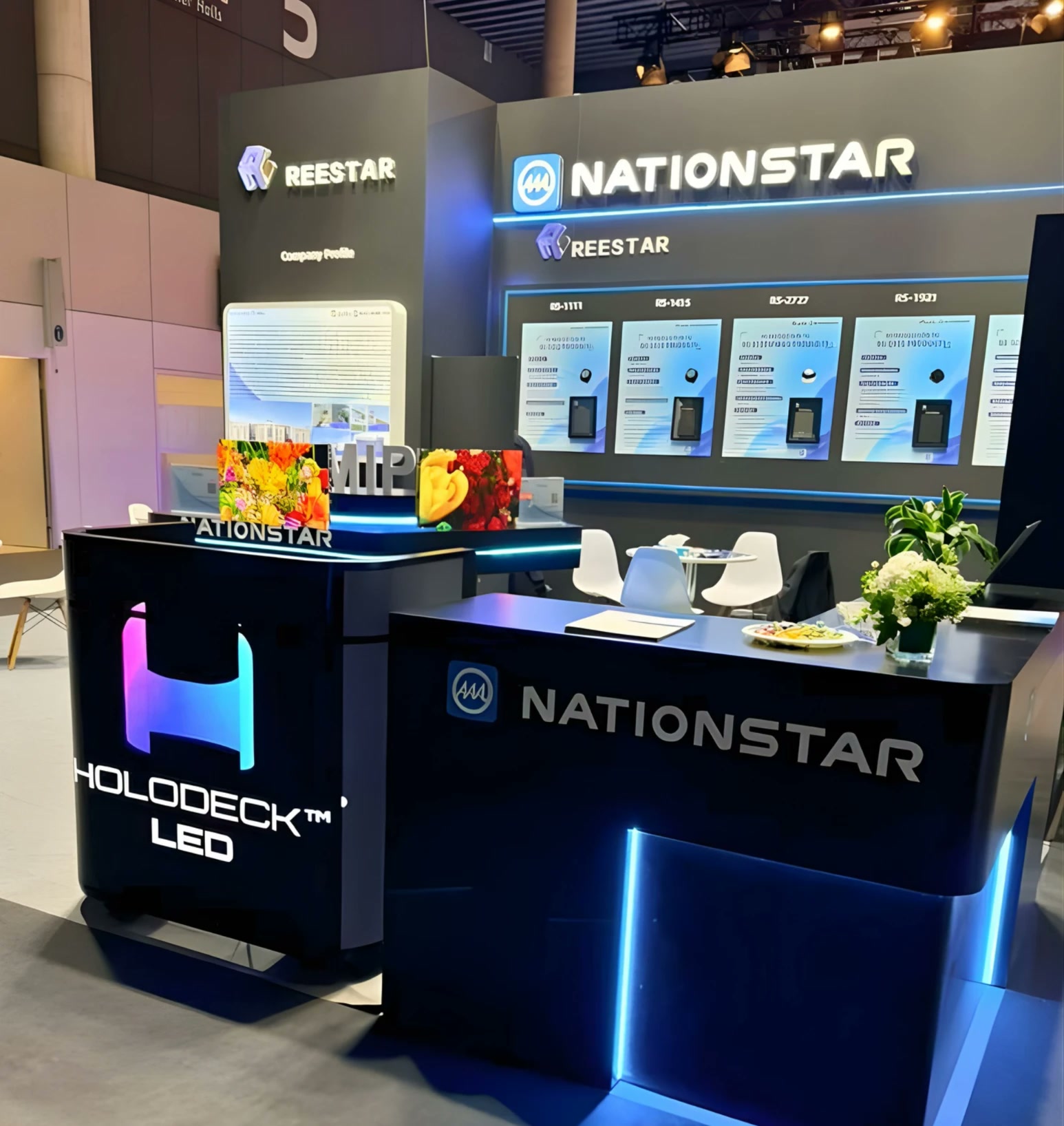 The HOLODECK LED and NationStar booth at ISE 2026 in Barcelona, with REESTAR and MiP displays