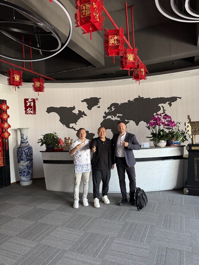 John Hu and Paul Galando of HOLODECK LED with Mr. Jiang, owner of Bentuo