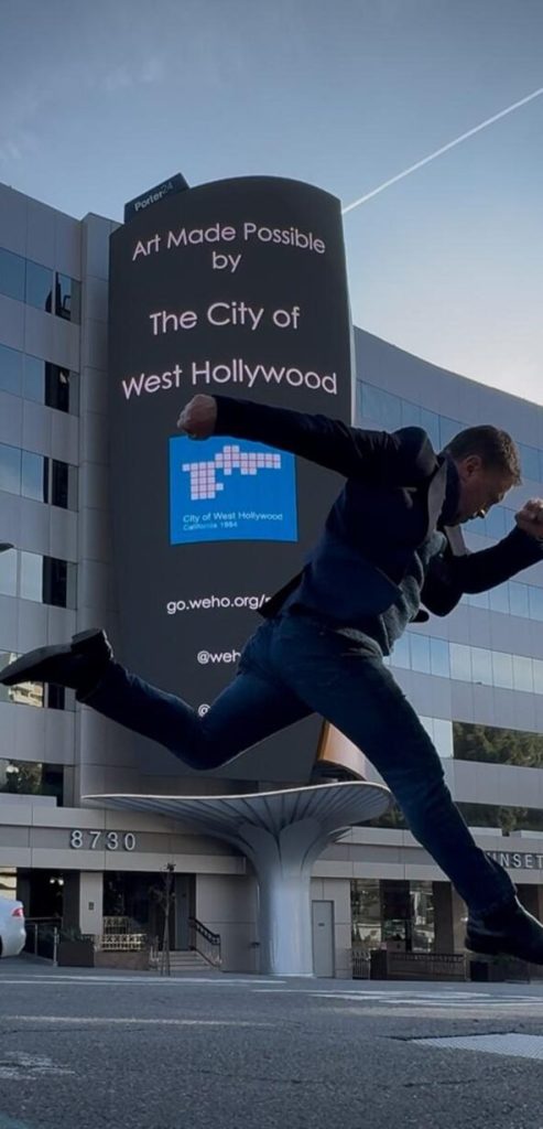 HOLODECK LED Sunset Sail billboard at 8730 Sunset Boulevard, West Hollywood
